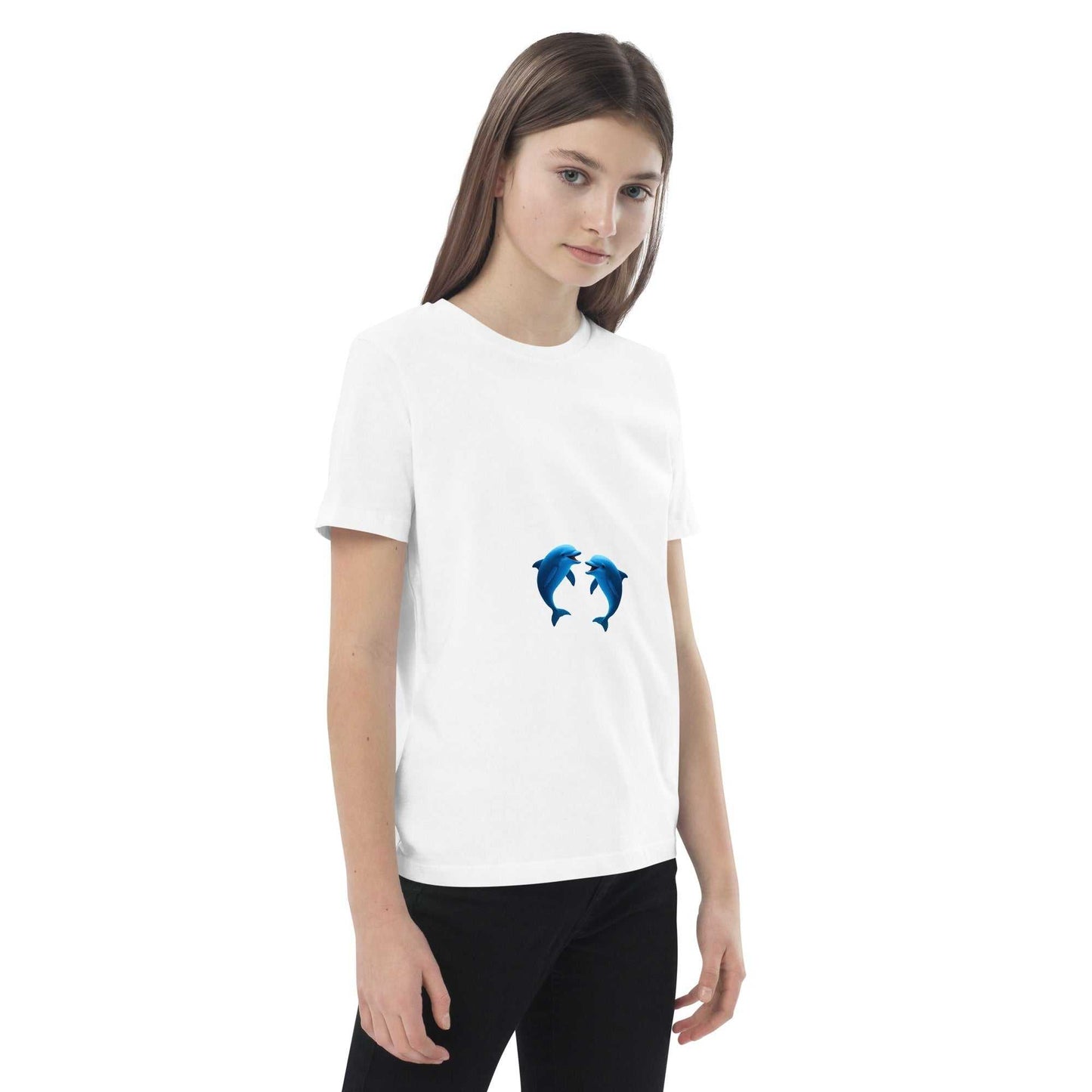 Side view of child in white Kids Eco T-Shirt with dolphins. Made from sustainable, GOTS-certified organic cotton.