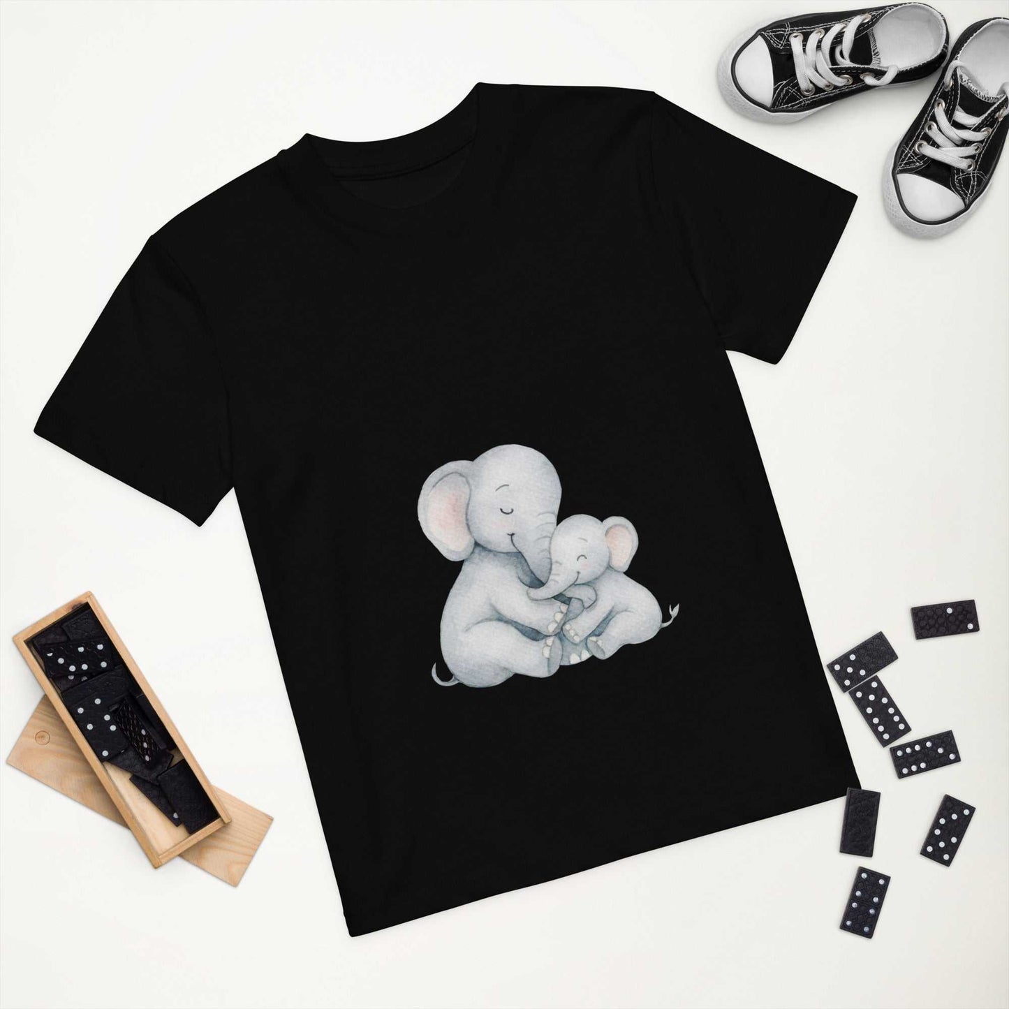 Flat lay of black Kids Organic Cotton T-Shirt - Elephant Design. GOTS certified, eco-friendly kids apparel with playful elephant print.