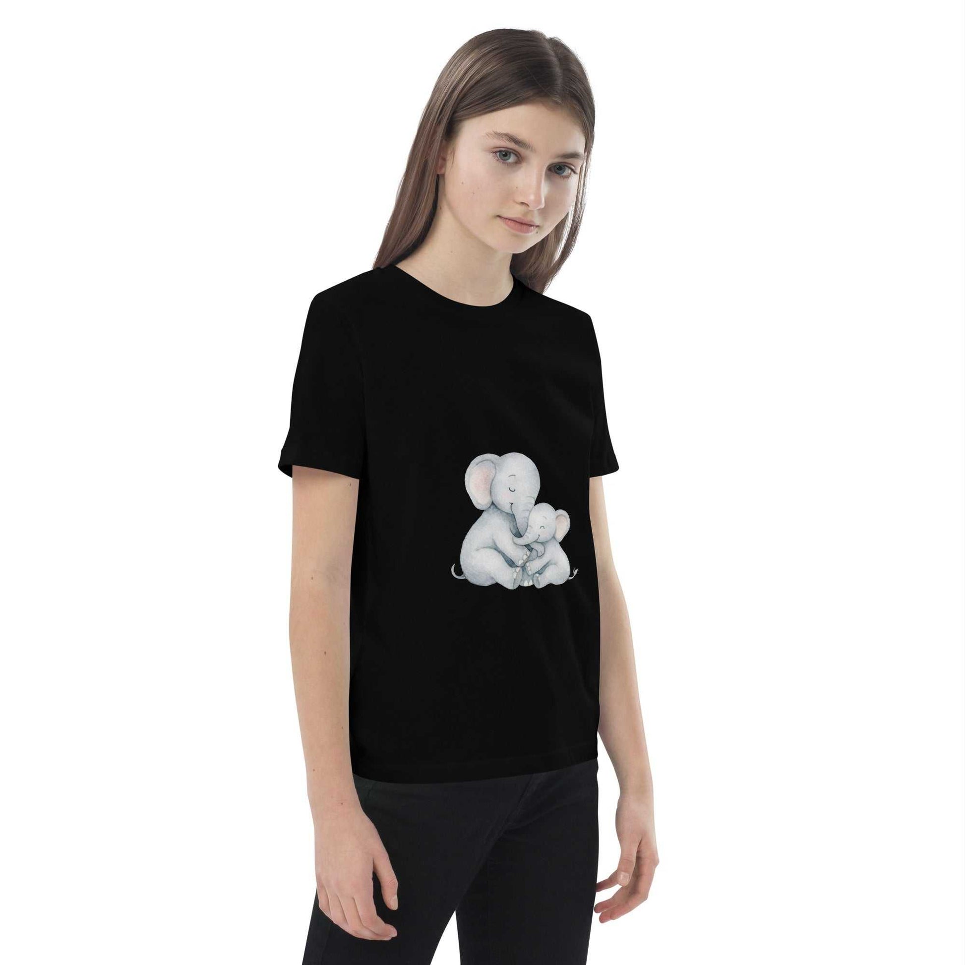 Side view of black Kids Organic Cotton T-Shirt with elephant print. Eco-conscious, GOTS certified kids apparel.