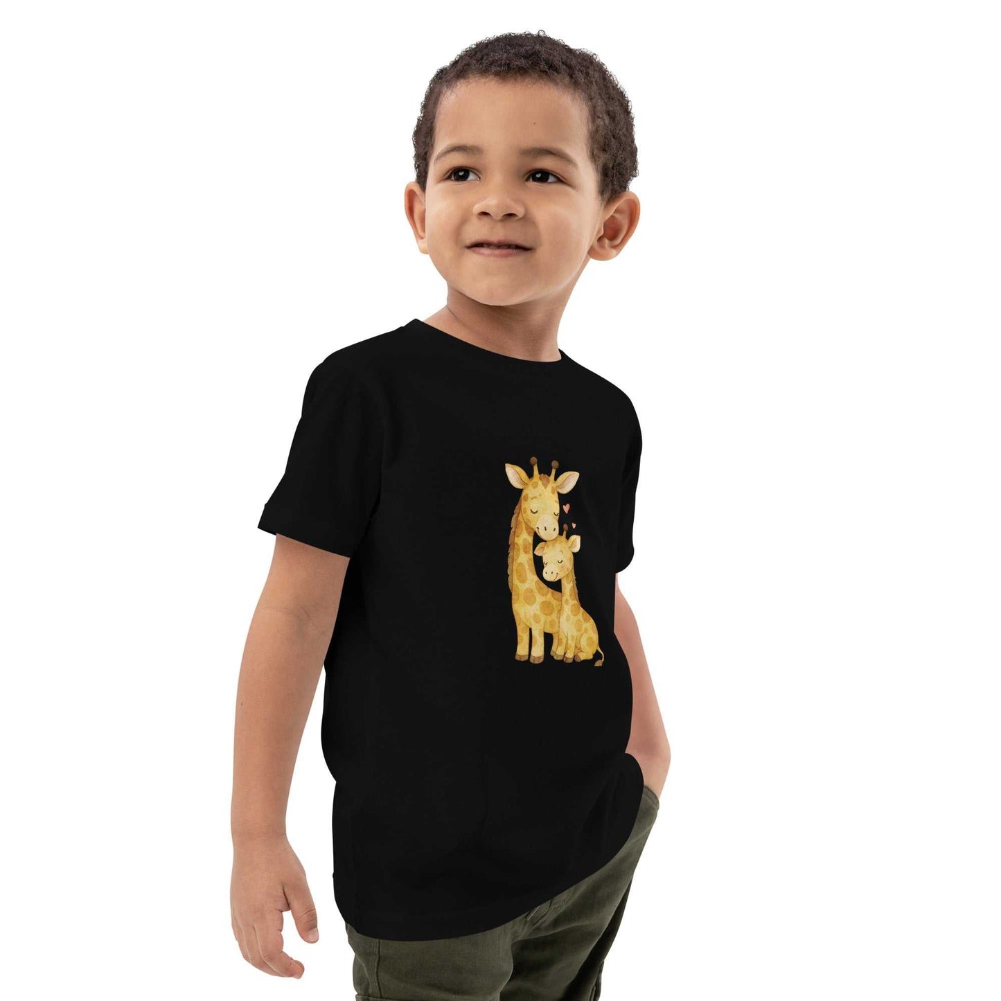 Kids Organic Cotton T-Shirt - black t-shirt with cute giraffe print, side view on child model, ideal for everyday comfort and play.