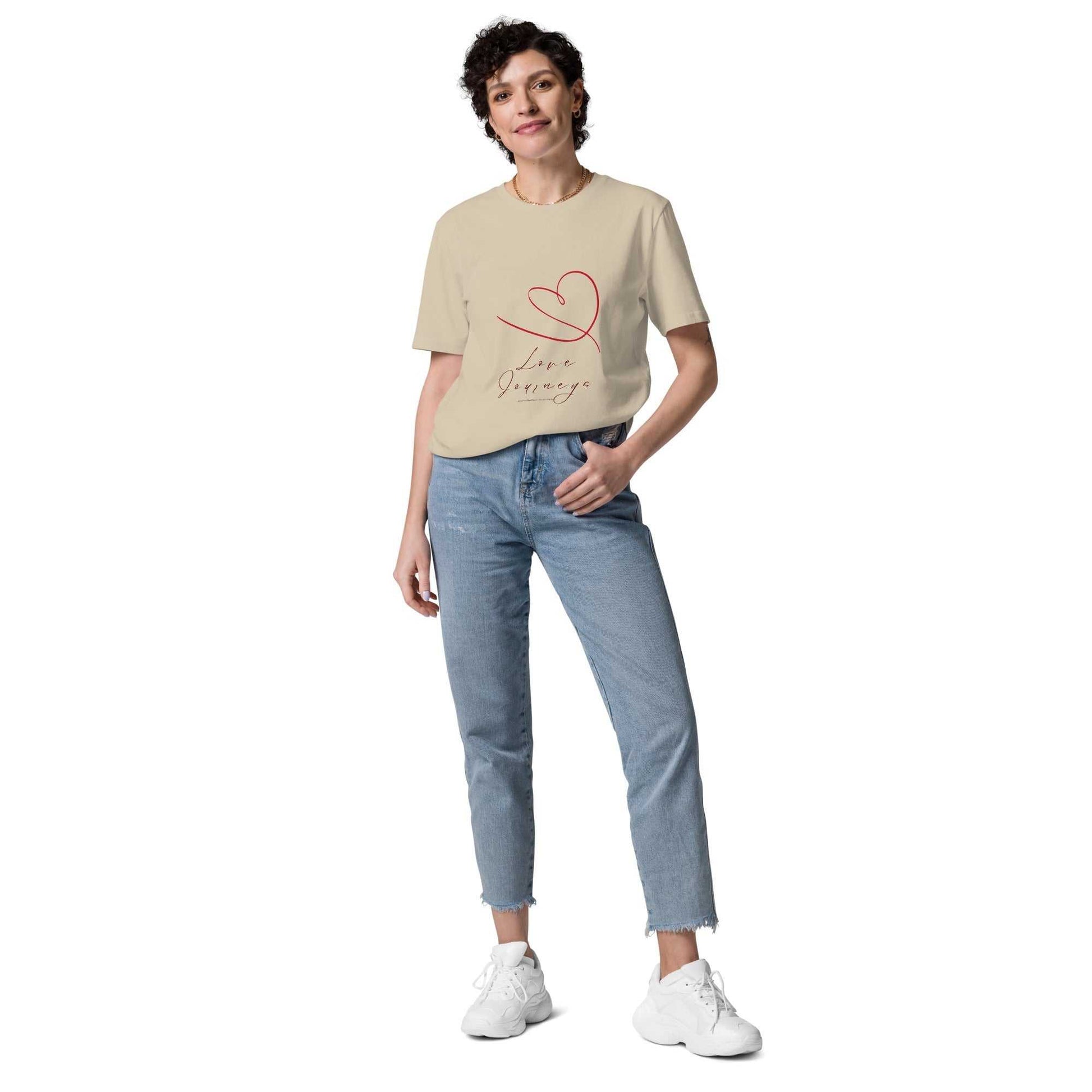 Love Journeys Unisex Organic Cotton T-Shirt in beige with minimalist red heart graphic. GOTS certified and perfect for casual wear.