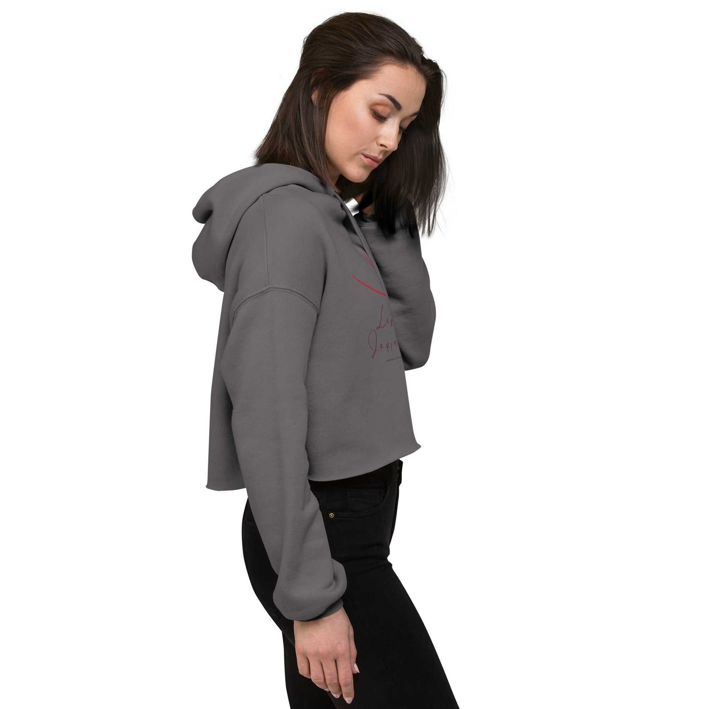 Side profile of grey cropped hoodie with love design worn by model. Hand-drawn heart and cozy fit ideal for stylish everyday wear.