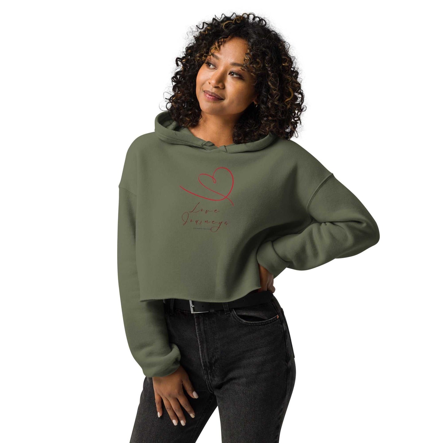 Model in olive green cropped hoodie love design with red heart and romantic script. Feminine and cozy, ideal for Valentine's or everyday wear.