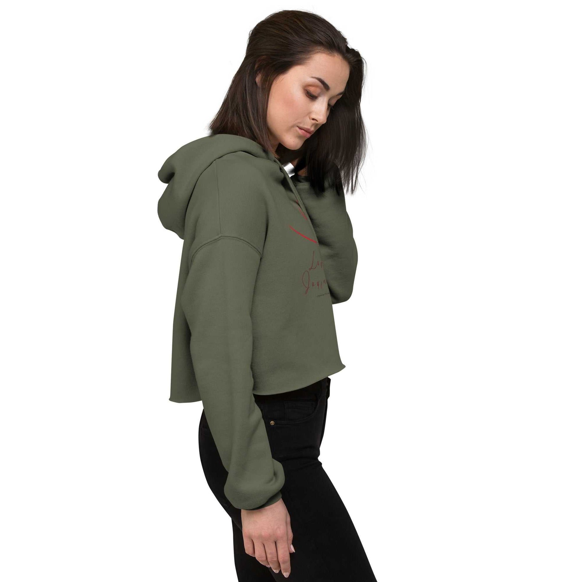 Side view of olive green cropped hoodie with love design. Feminine heart graphic and cozy cotton blend make it a must-have for Valentine's.