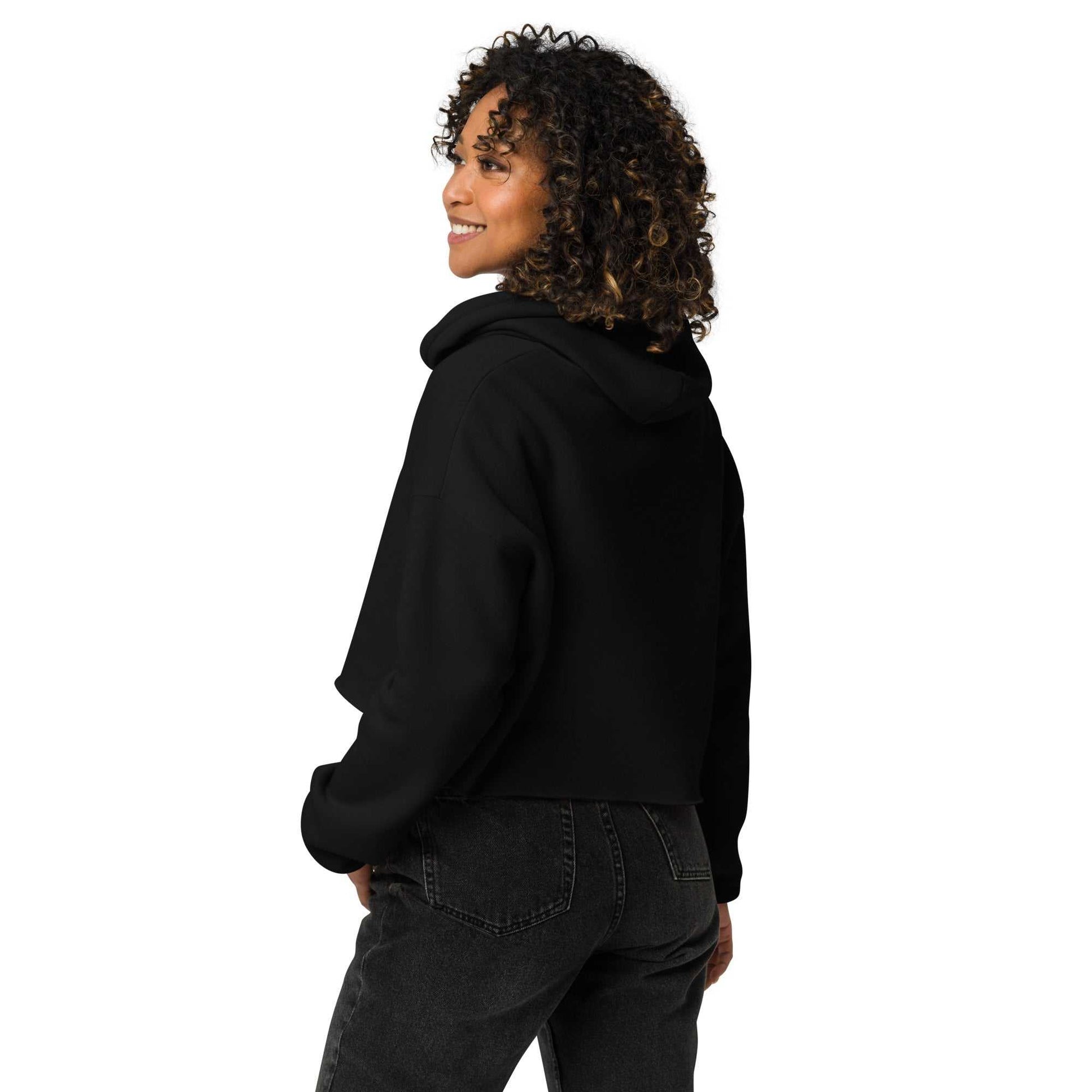 Back view of black cropped hoodie with love design. Relaxed fit and soft cotton blend offer comfort and style for women's casual outfits.