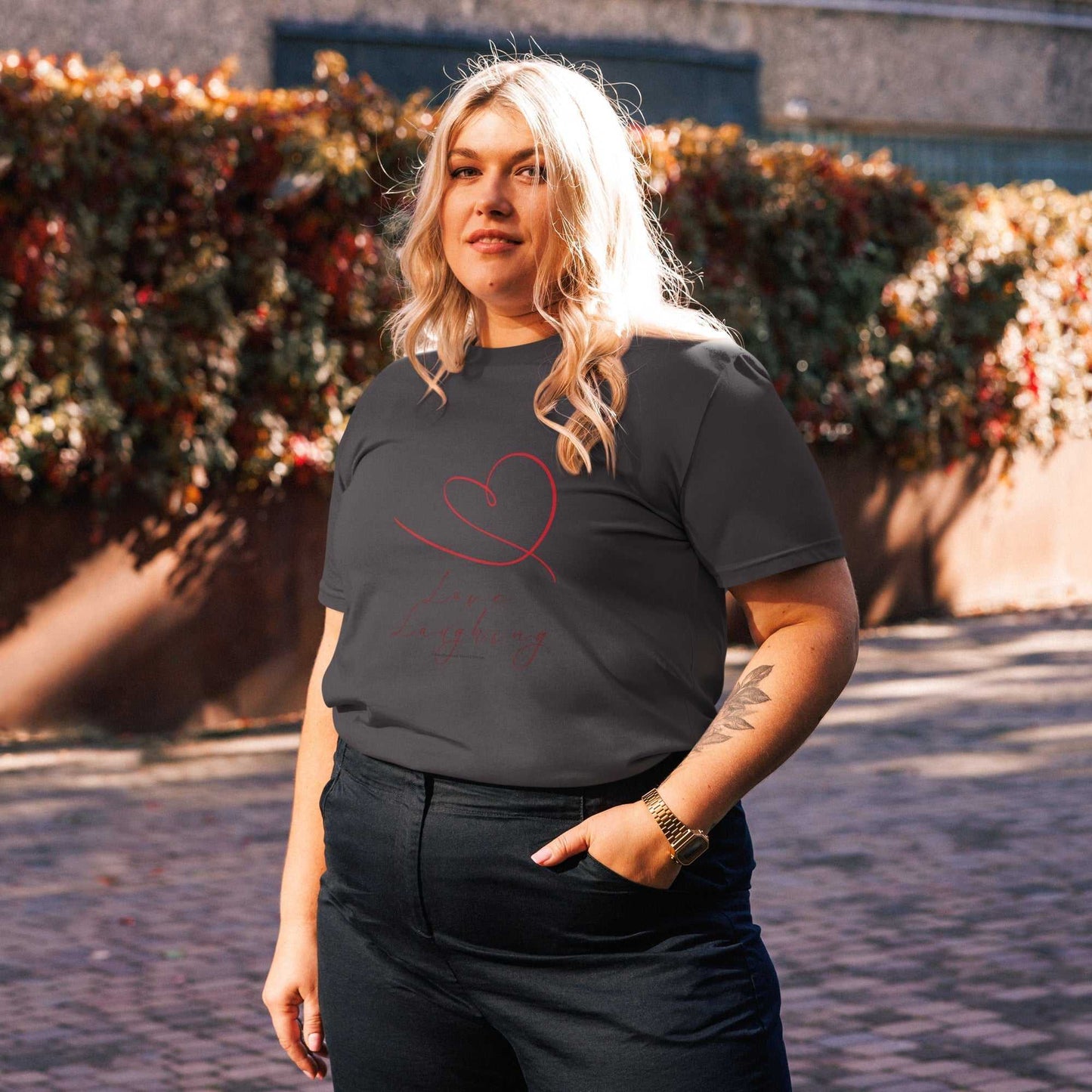Charcoal Love Laughing T-Shirt in organic cotton, unisex fit with minimalist heart and text graphic for sustainable fashion.