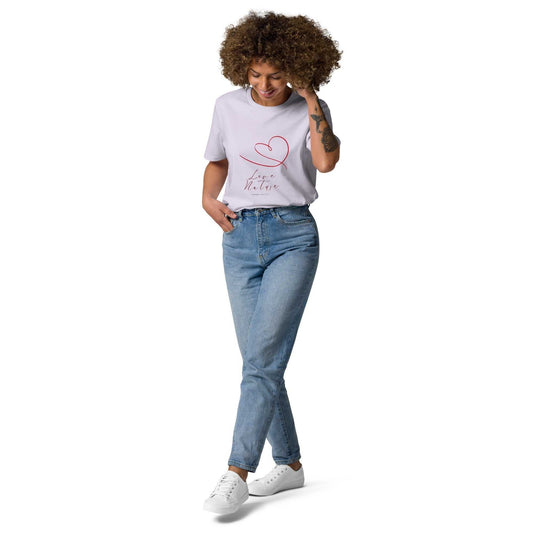 Love Nature unisex organic cotton t-shirt in white with red heart design, styled with blue jeans for a casual eco-friendly look.