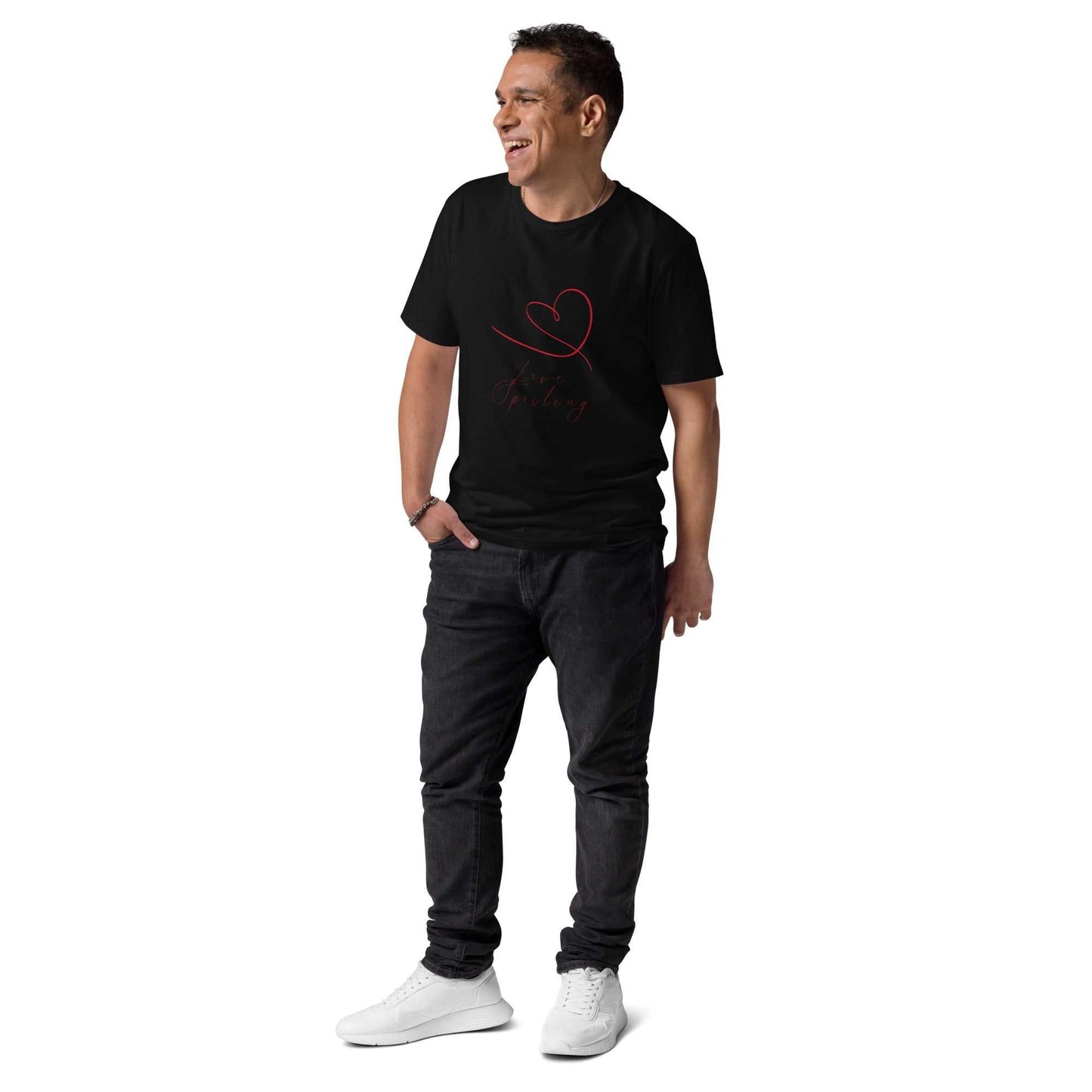 Love Spoiling T-Shirt - Unisex Organic Cotton in black, worn by model. Red heart design adds charm to sustainable casual fashion.