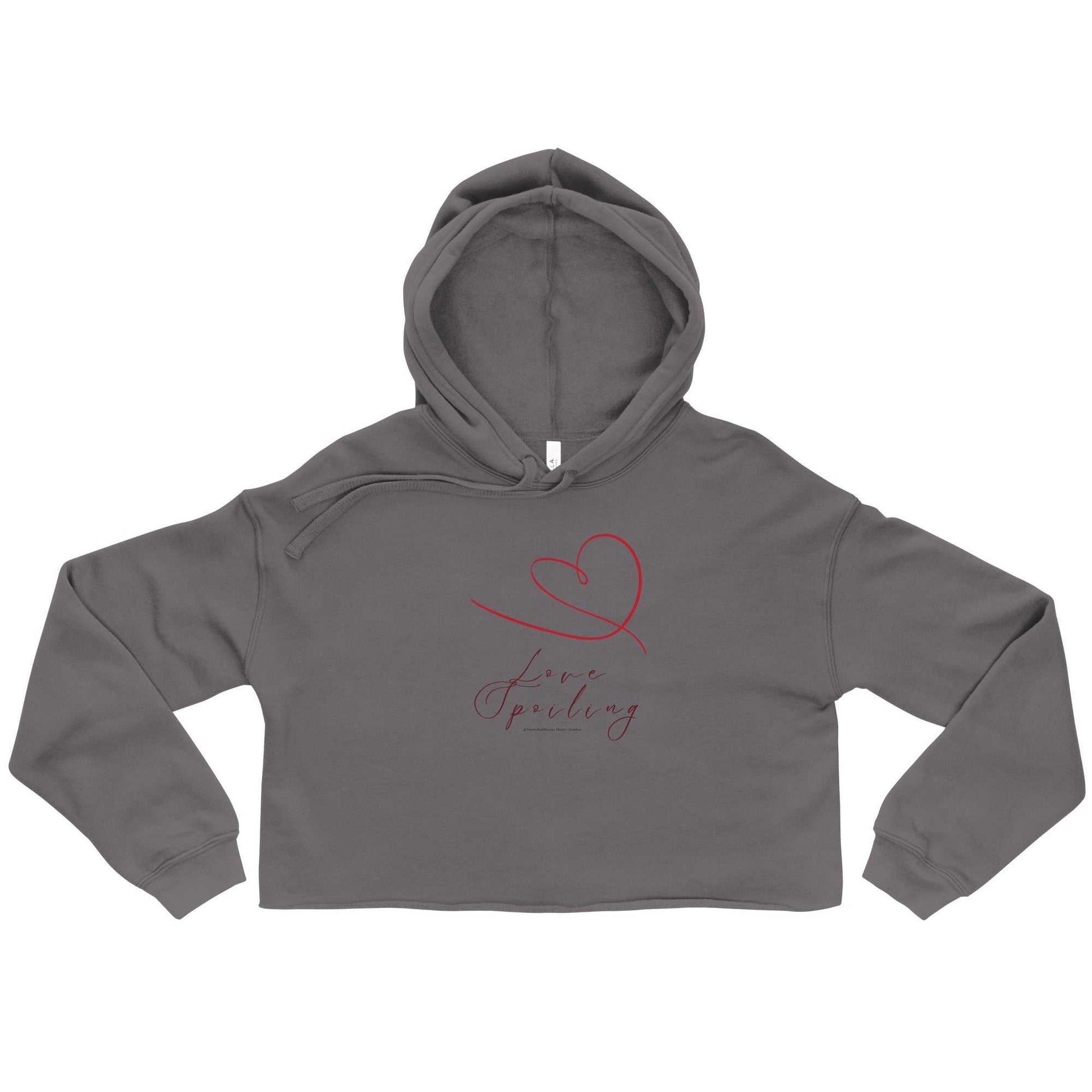 Charcoal gray cropped hoodie featuring red heart and 'Love Spilling' script, trendy Valentine's Day activewear for women.
