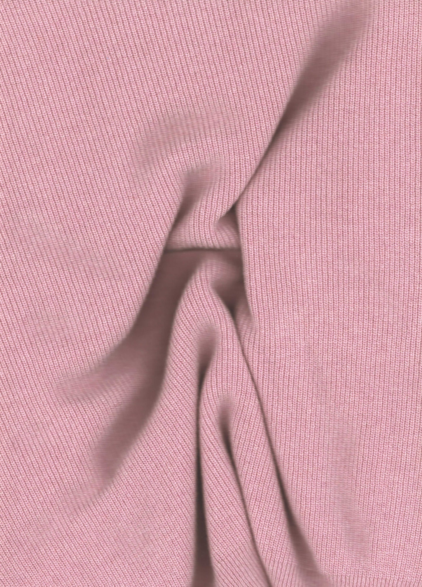 Soft pink Cashmere Mix Triangle Scarf fabric close-up. Lightweight Italian knitwear perfect for elegant, all-season wear.