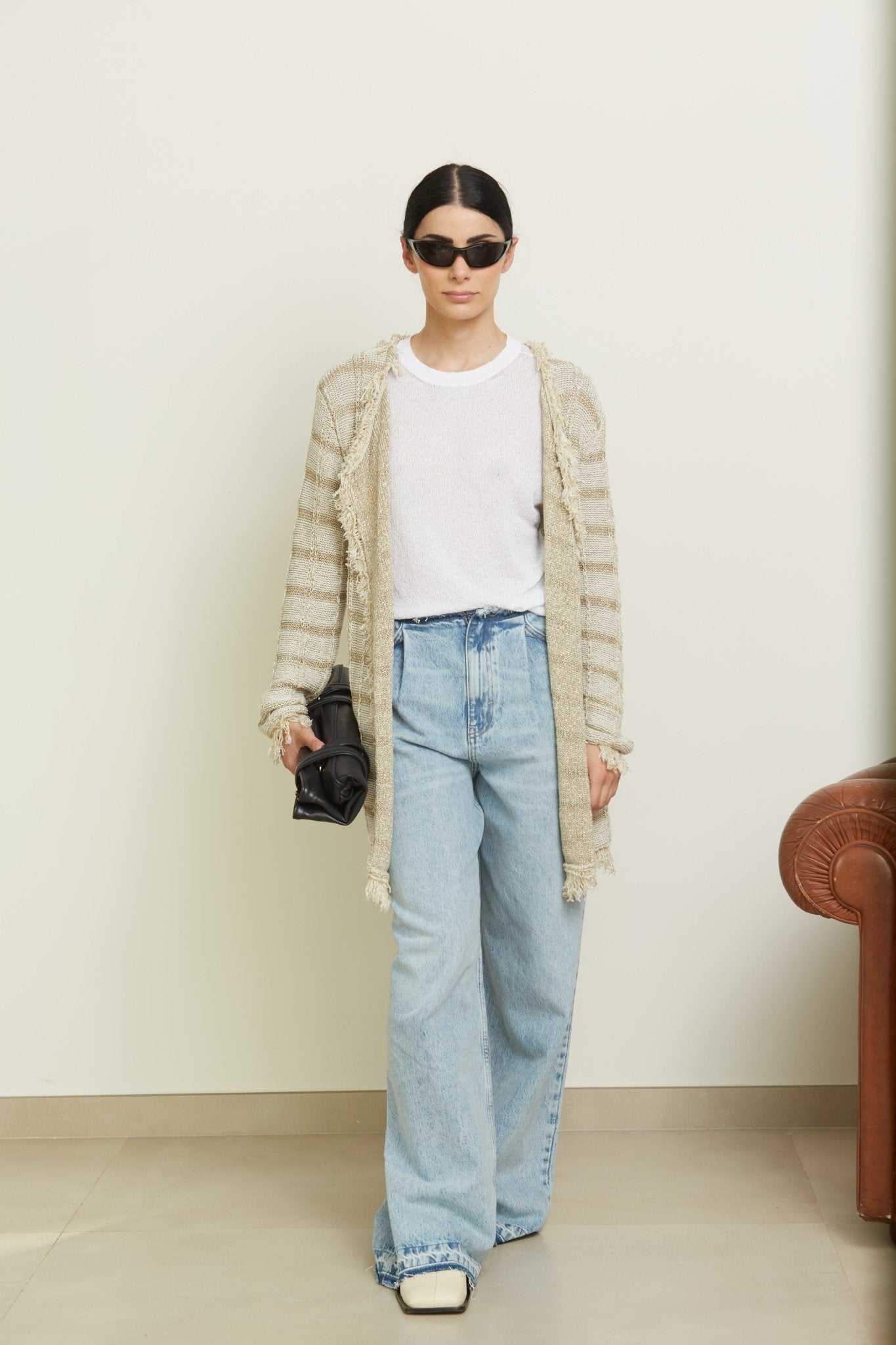 Front view of Olivia Midi Cardigan with Lurex Inserts by Tenné, worn open over casual outfit, showcasing soft viscose-cotton blend and fringe detail.