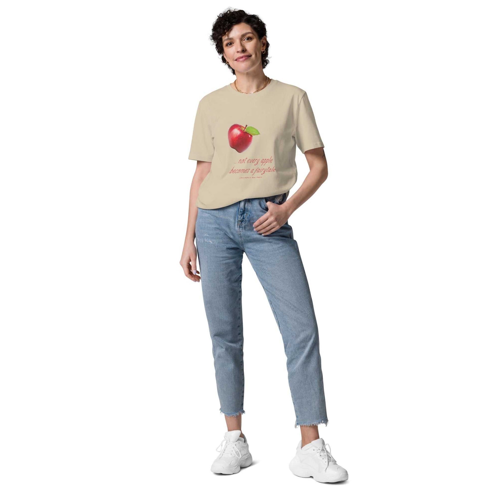 Beige unisex organic cotton t-shirt with red apple graphic and fun quote. Perfect for eco-conscious and stylish shoppers.