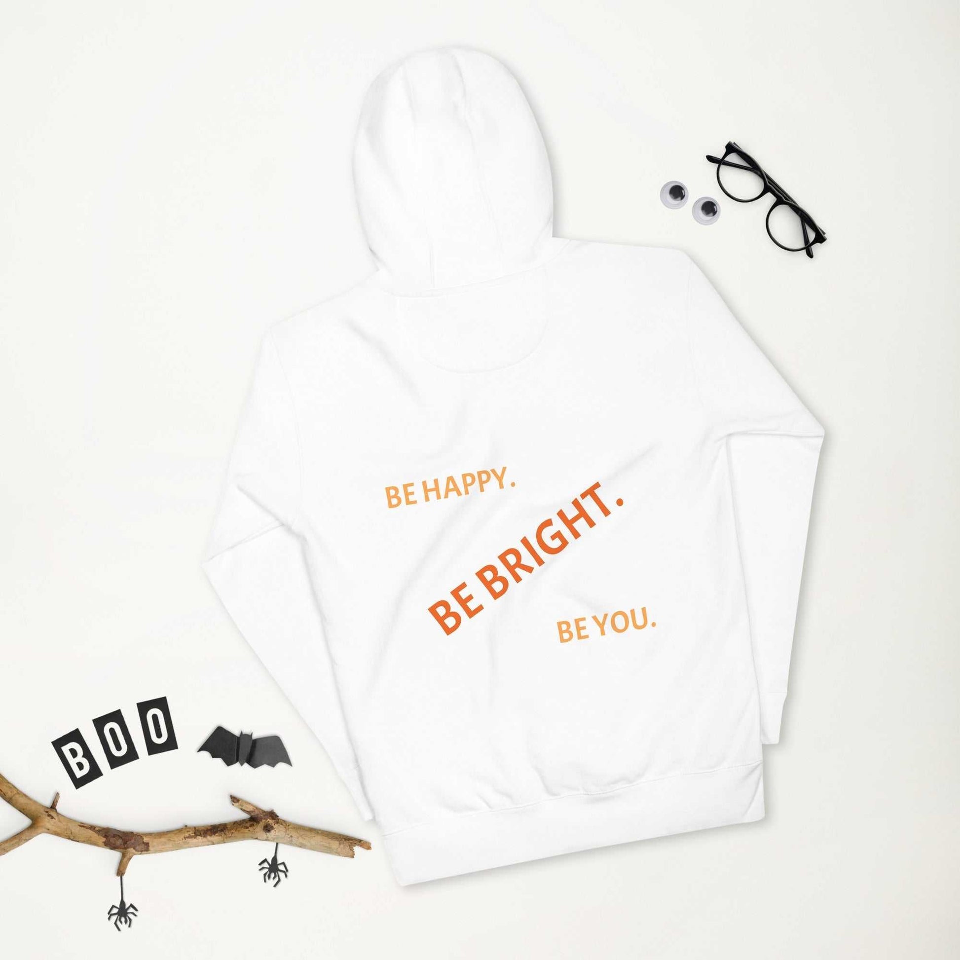 Premium unisex hoodie for comfort in white with 'Be Happy. Be Bright. Be You.' text design, ideal for casual wear and seasonal style.