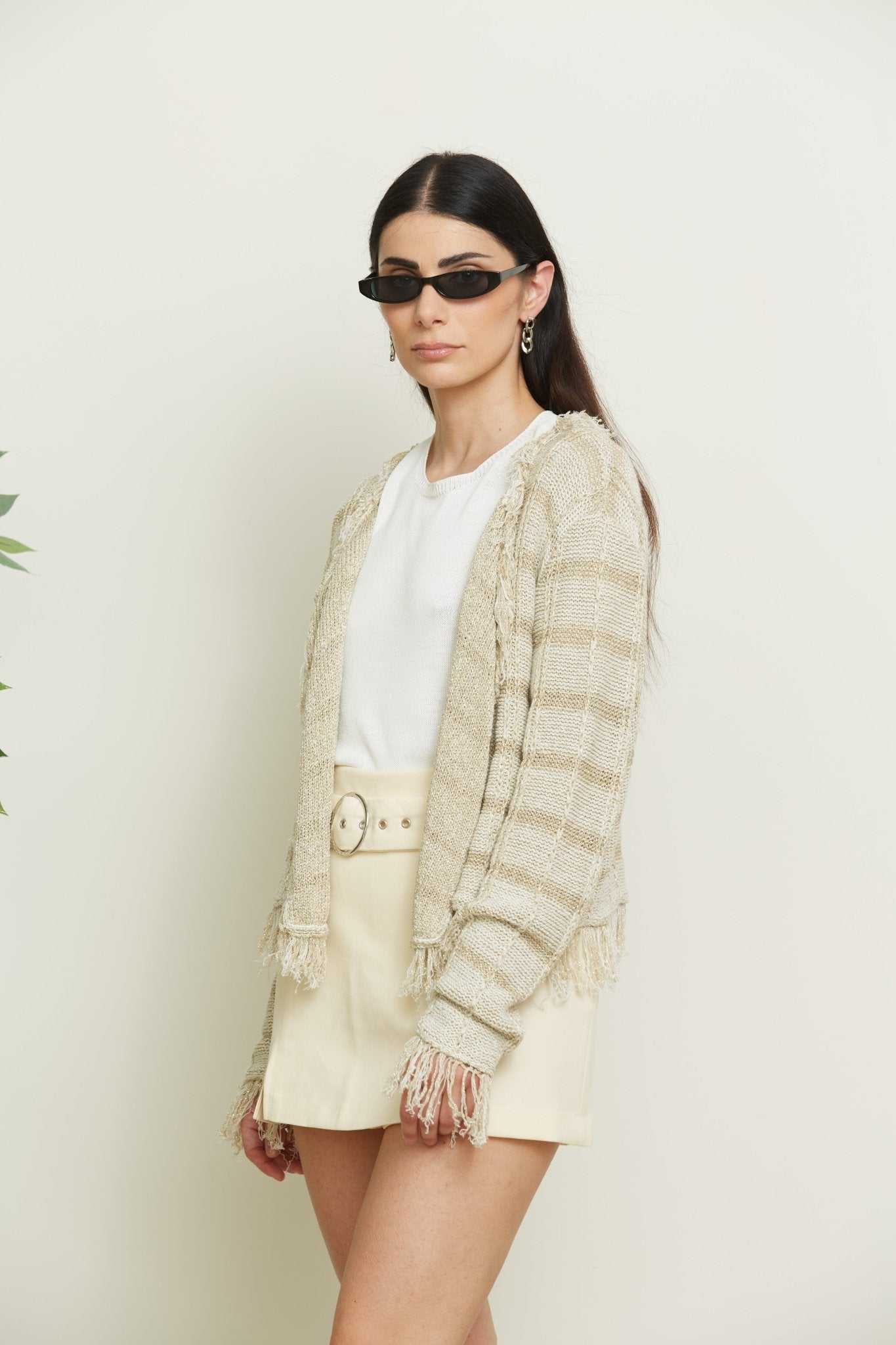 Close-up of Ornella Short Cardigan with Lurex Inserts in beige, showing fringe details and textured knit, ideal for elegant spring layering.