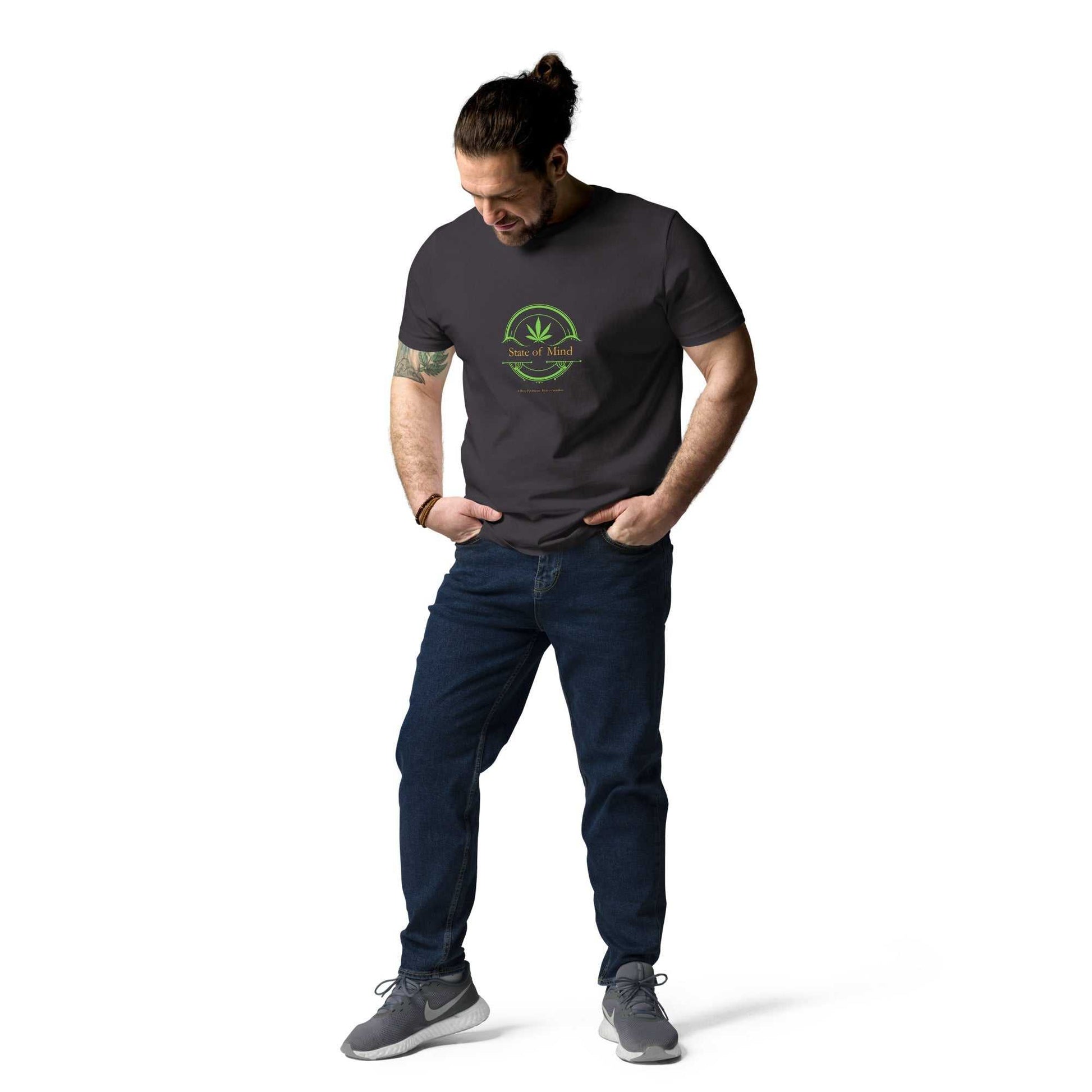 Charcoal State of Mind organic cotton unisex t-shirt styled with casual jeans. Fresh green emblem for a sustainable fashion statement.