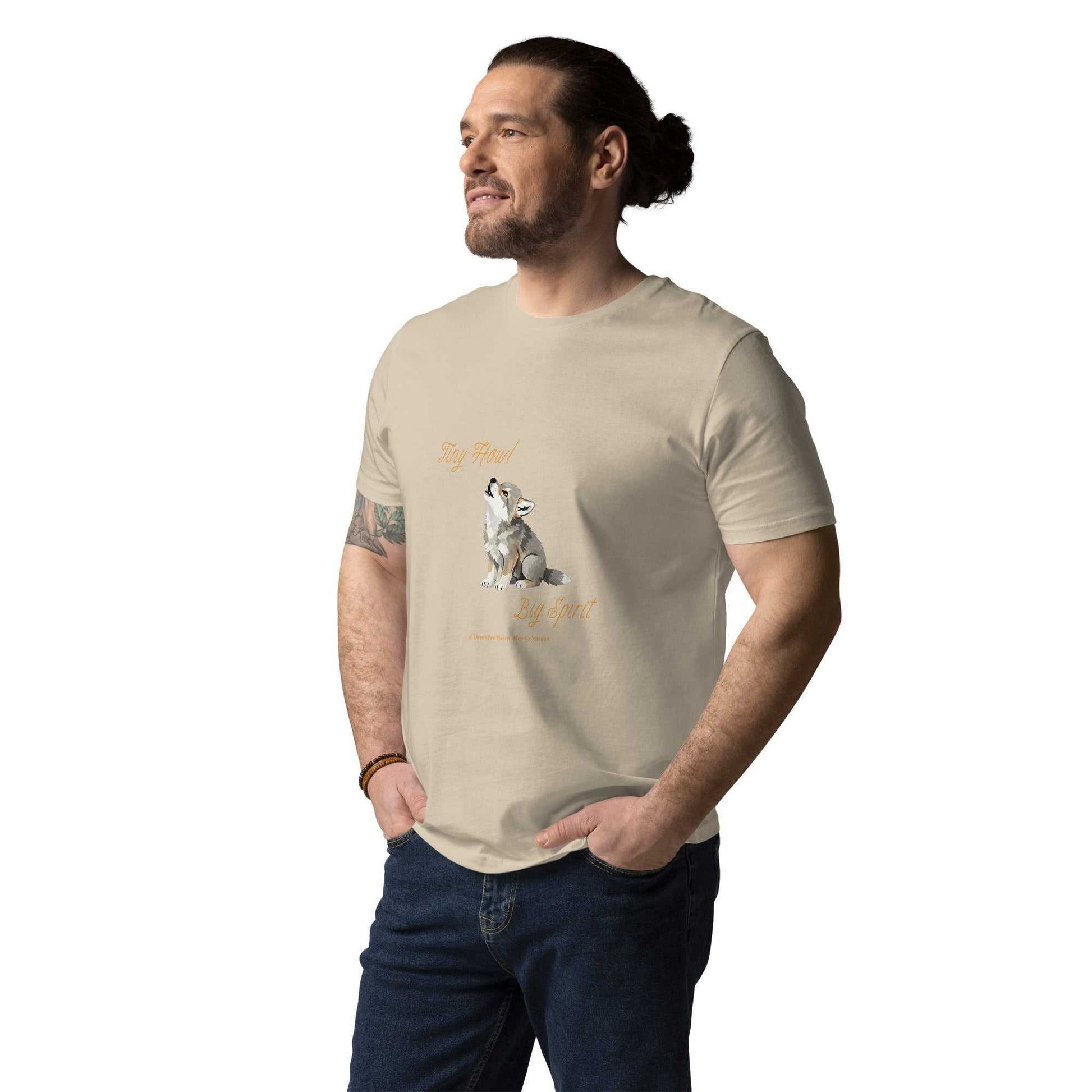 Beige unisex t-shirt made from organic cotton with Tiny Howl Big Spirit baby wolf design. Ideal for sustainable fashion lovers.