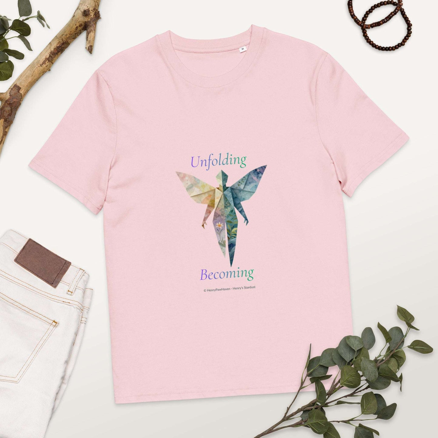 BOMBY Unfolding origamis silhouette Organic Cotton T-Shirt in pink with artistic butterfly-winged figure and inspirational message.