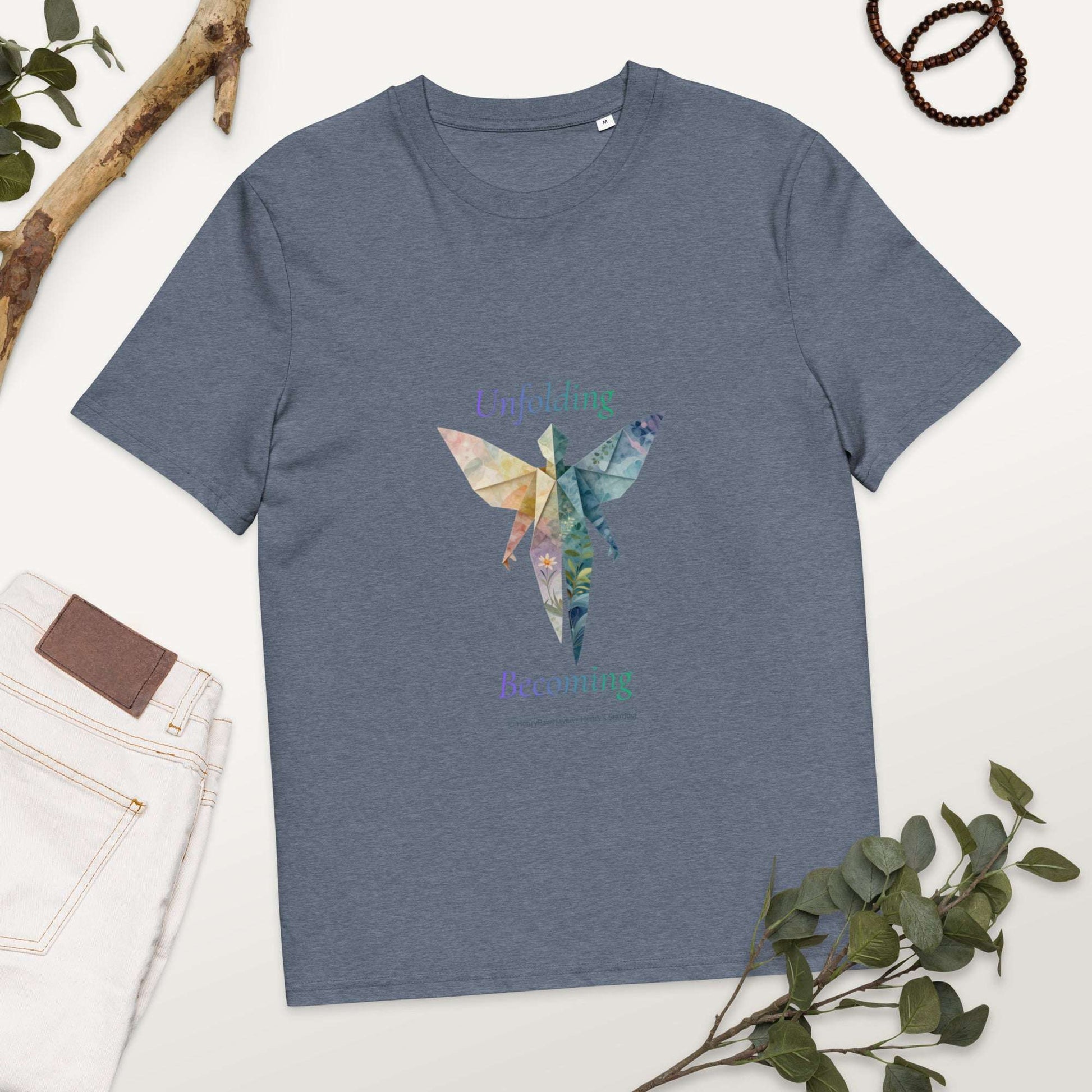BOMBY Unfolding origamis silhouette Organic Cotton T-Shirt in denim blue showcasing colorful origami butterfly and 'Unfolding Becoming' slogan.