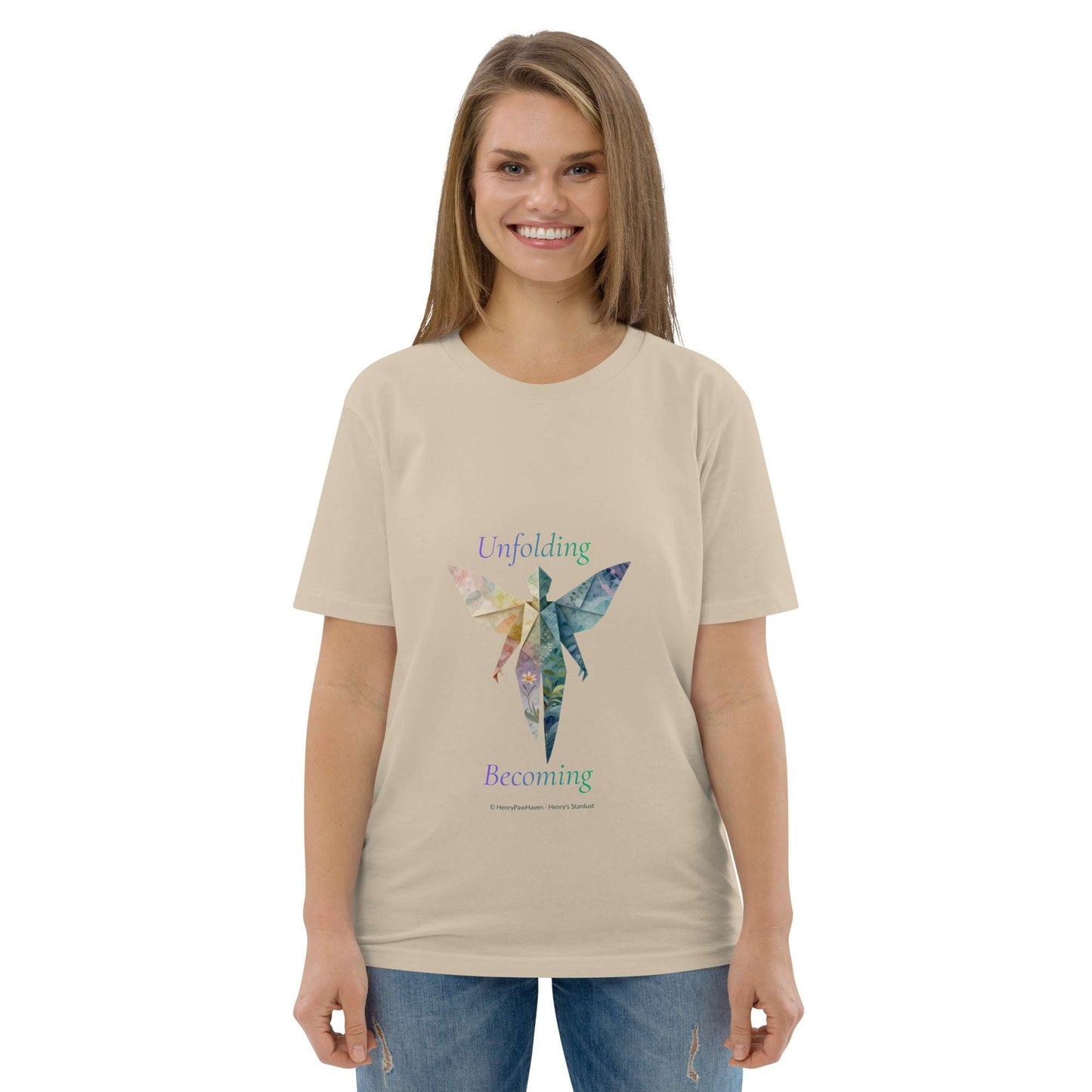 BOMBY Unfolding origamis silhouette Organic Cotton T-Shirt in beige with vibrant butterfly origami graphic and 'Unfolding Becoming' text.