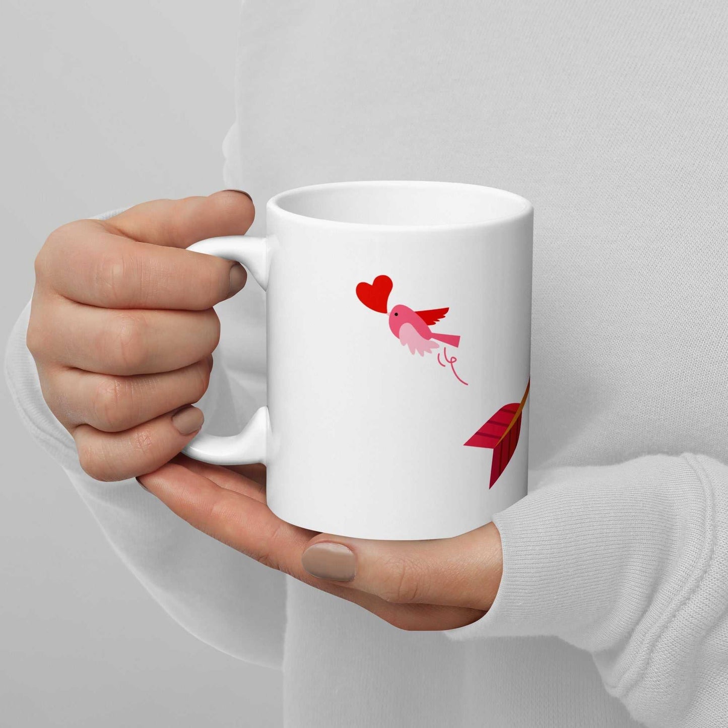 Valentine Mug Gift with arrow, lollipops, and pink bird holding heart design, 11 oz ceramic mug ideal for Valentine's Day gifting.