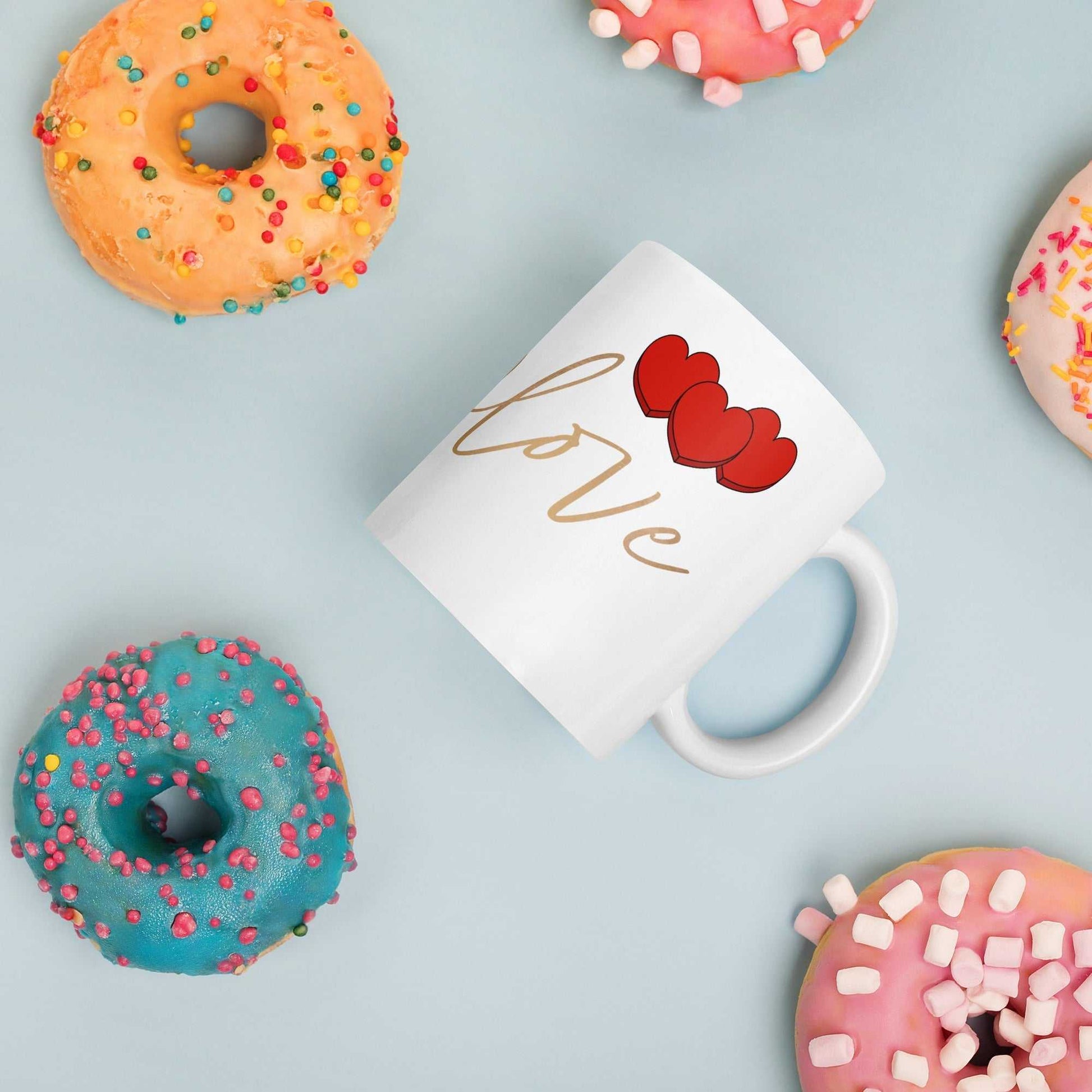 Valentine Mug - Envelope & Hearts gift surrounded by donuts, ceramic 11 oz, red hearts and love script, perfect for sweet gifting.