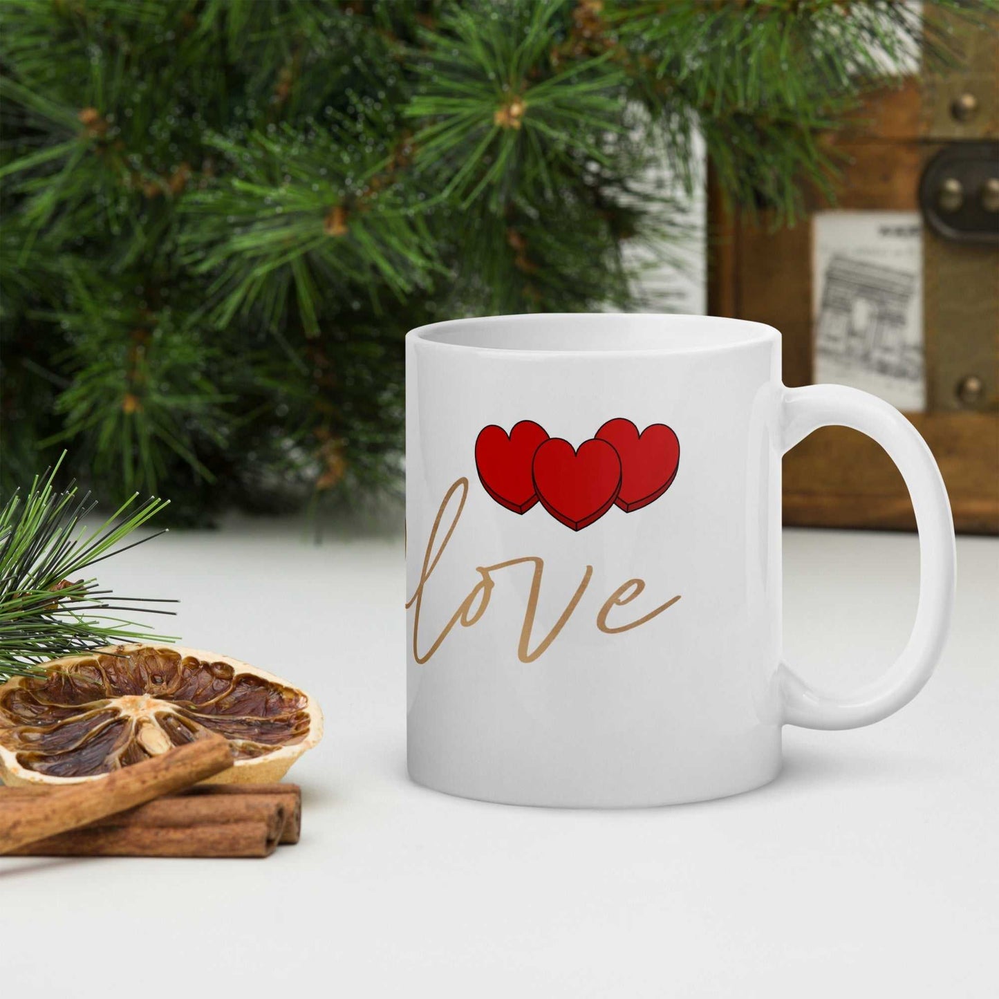 Valentine Mug - Envelope & Hearts gift with red hearts and love script, ceramic 11 oz, shown in cozy holiday setting.