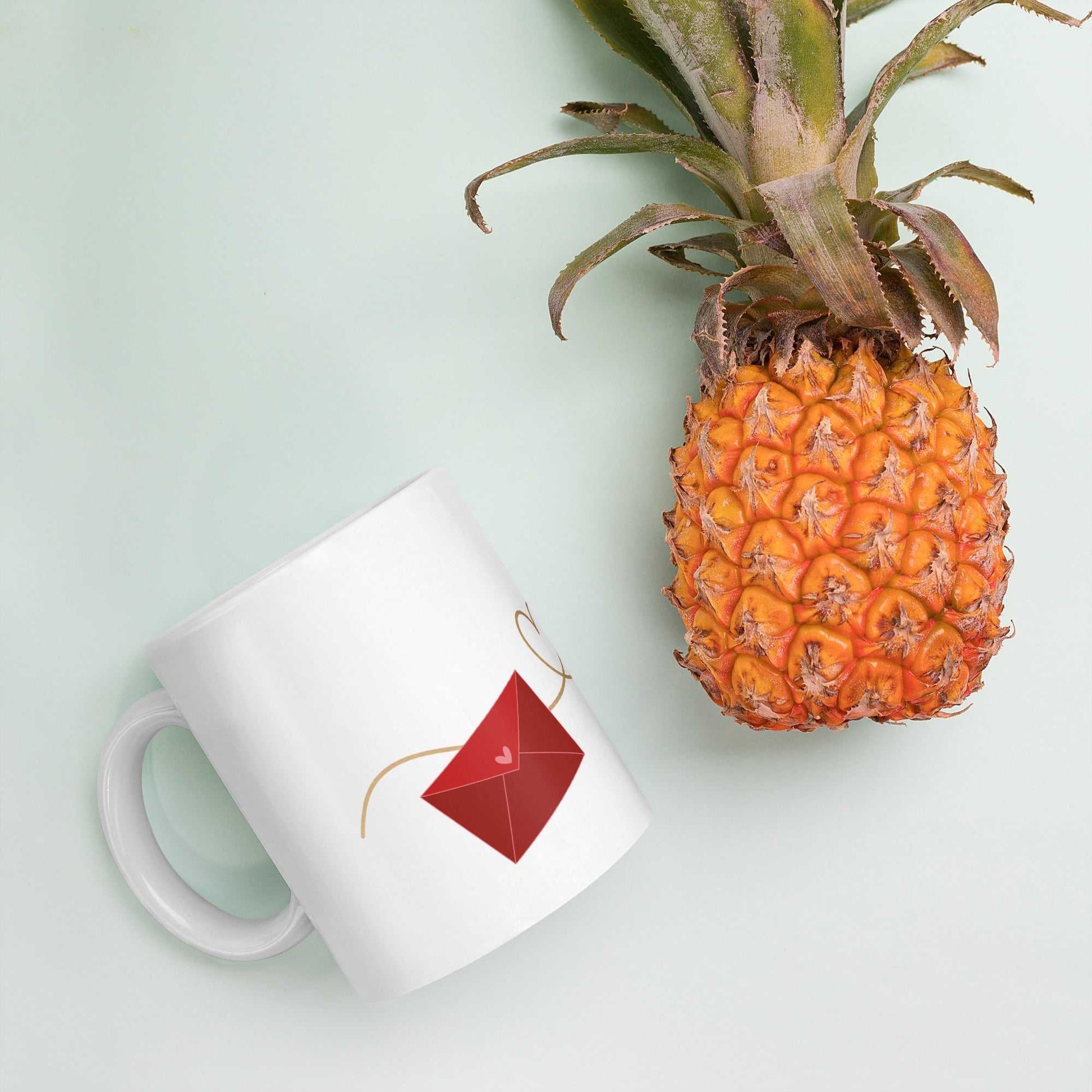 Valentine Mug - Envelope & Hearts gift next to pineapple, ceramic 11 oz, red envelope design, fun and romantic drinkware.