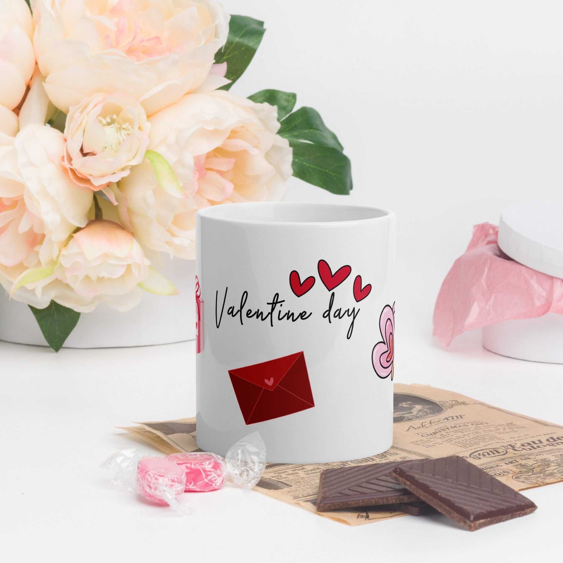 Valentine Mug - Ceramic Hearts Gift featuring red envelope and hearts, styled with flowers and sweets for romantic gifting.