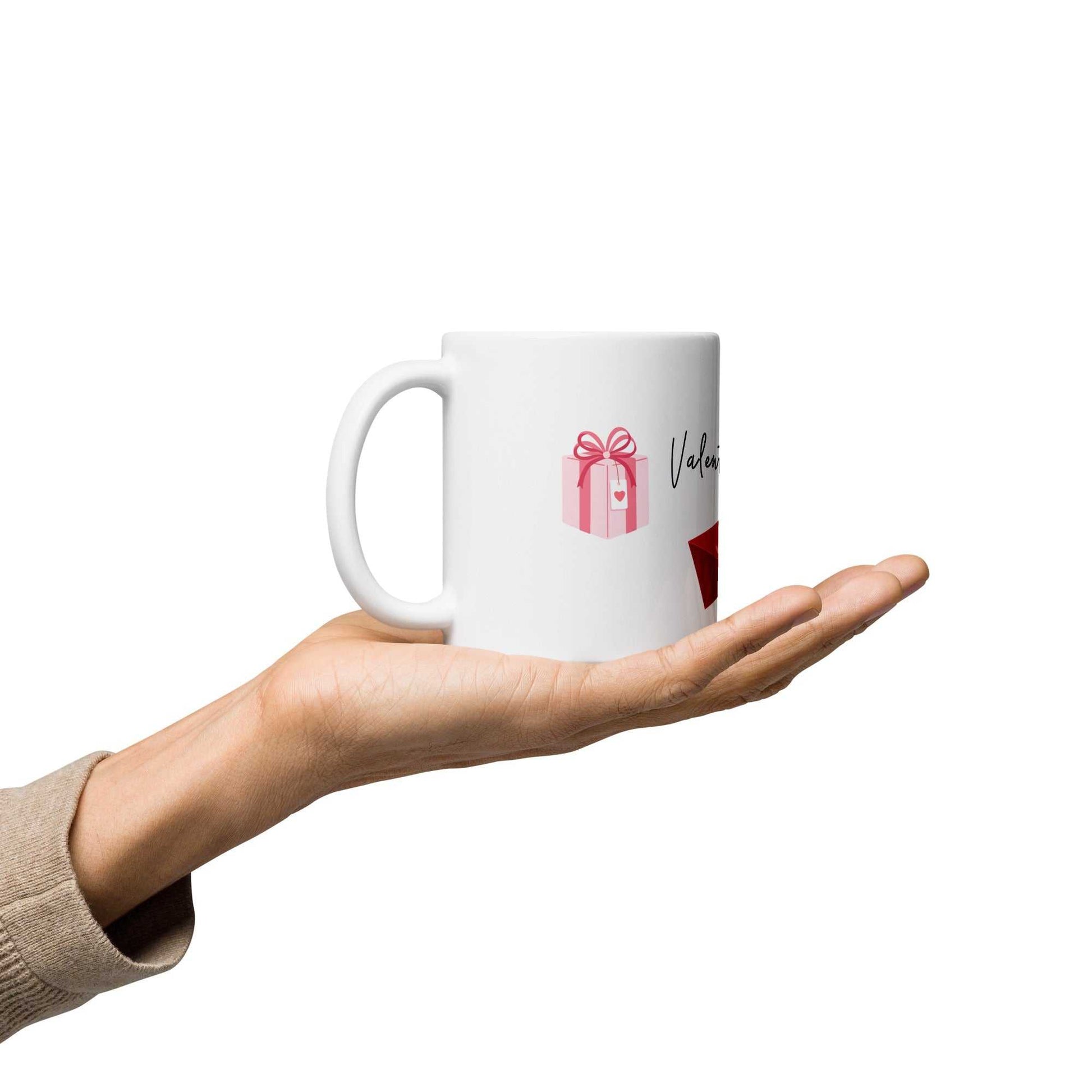 Hand presenting Valentine Mug - Ceramic Hearts Gift with pink gift box, perfect for Valentine's Day surprises.