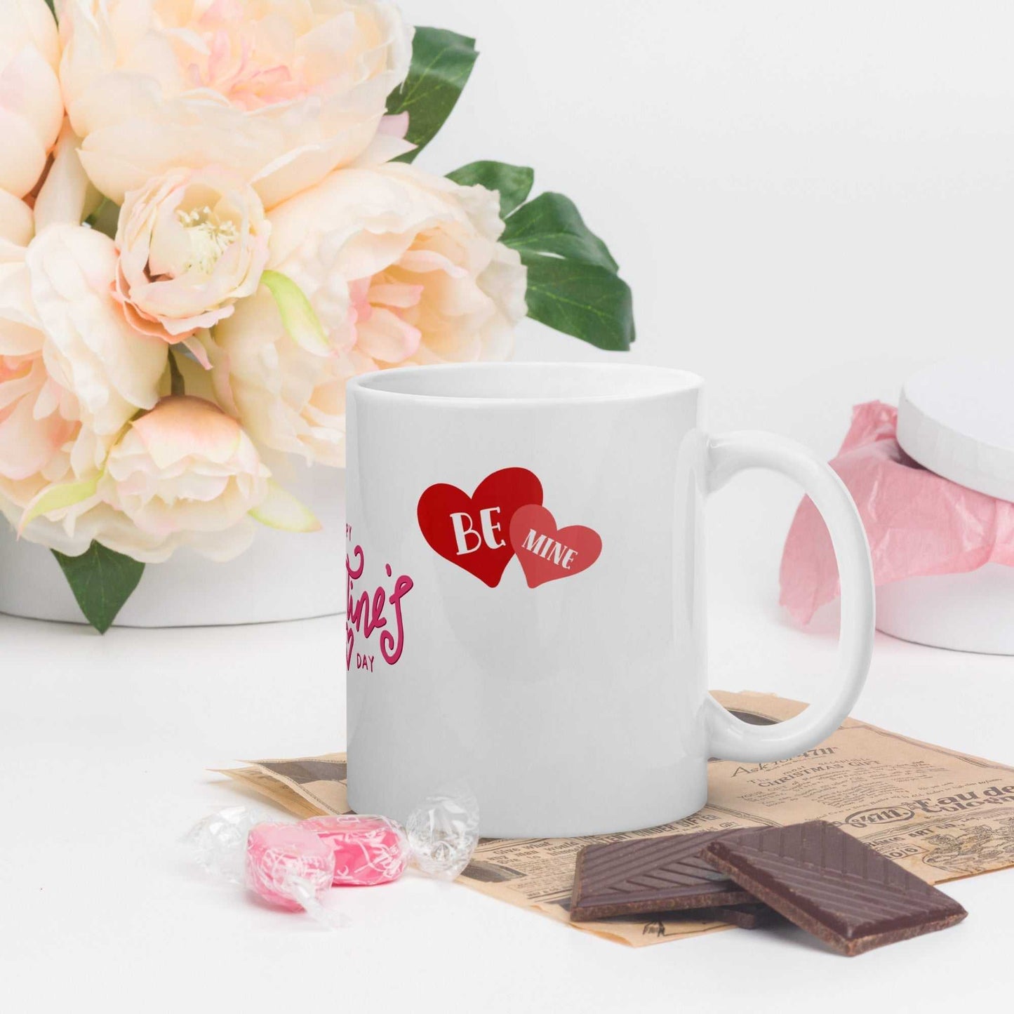 Valentine Mug - valentine mug | 11oz ceramic drinkware with 'Be Mine' heart design, styled with flowers and chocolate, ideal for gifting.