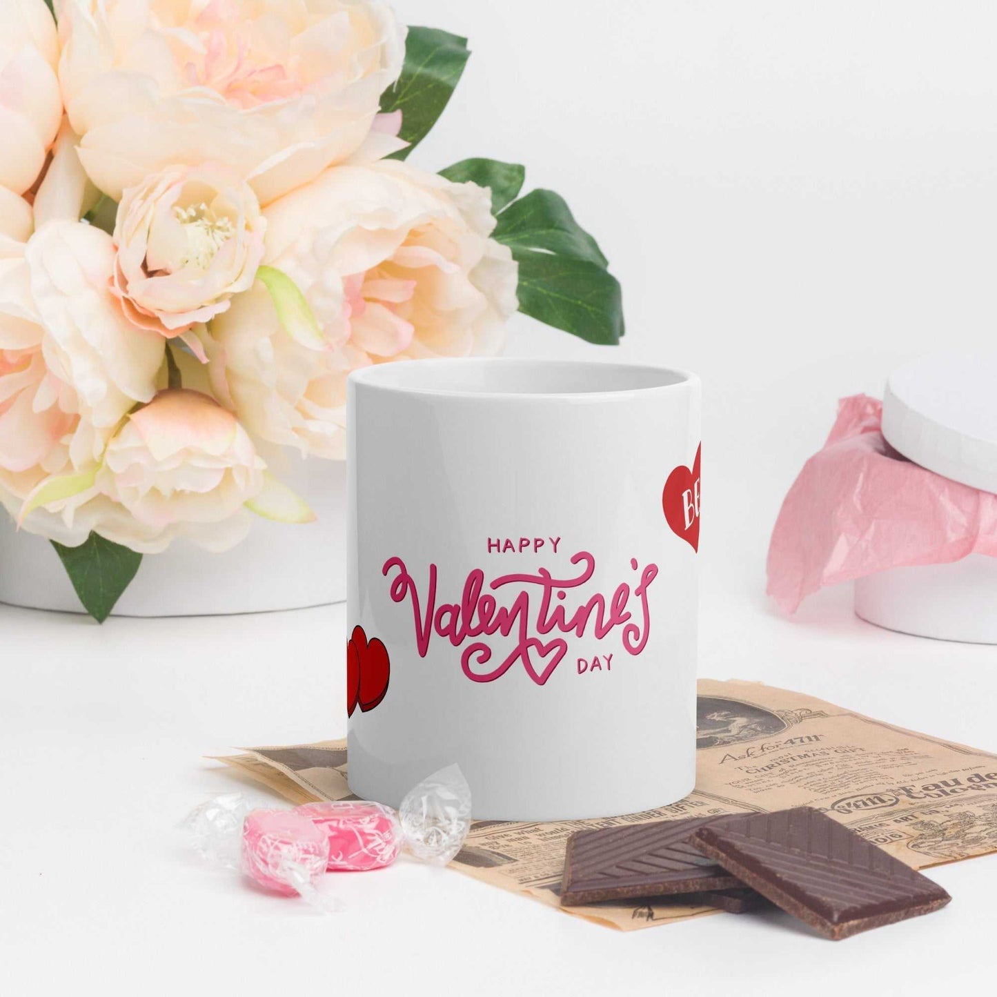 Valentine Mug - valentine mug | 11oz ceramic drinkware with pink Happy Valentine's Day text, styled with flowers and sweets.