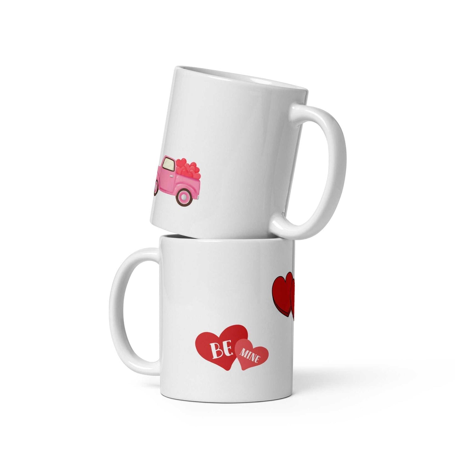 Stacked Valentine mugs with red heart and 'Be Mine' text, perfect for gifting or festive tableware decor.