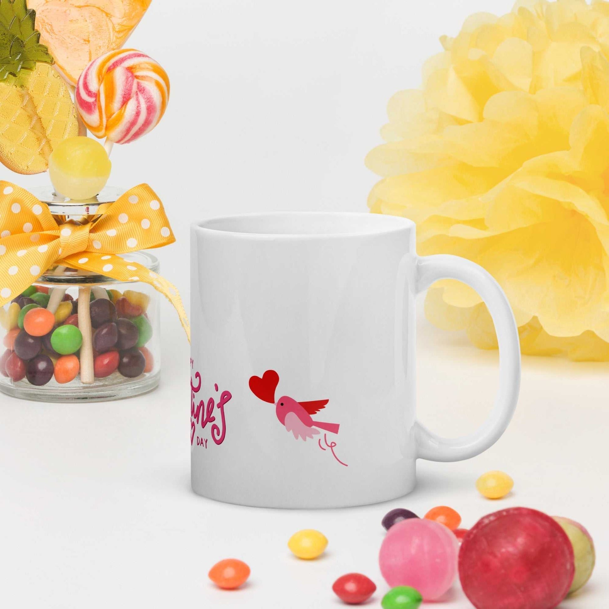Valentine Mug Ceramic with pink bird and heart, 11oz mug styled with candy and yellow decor, great for festive gifting.