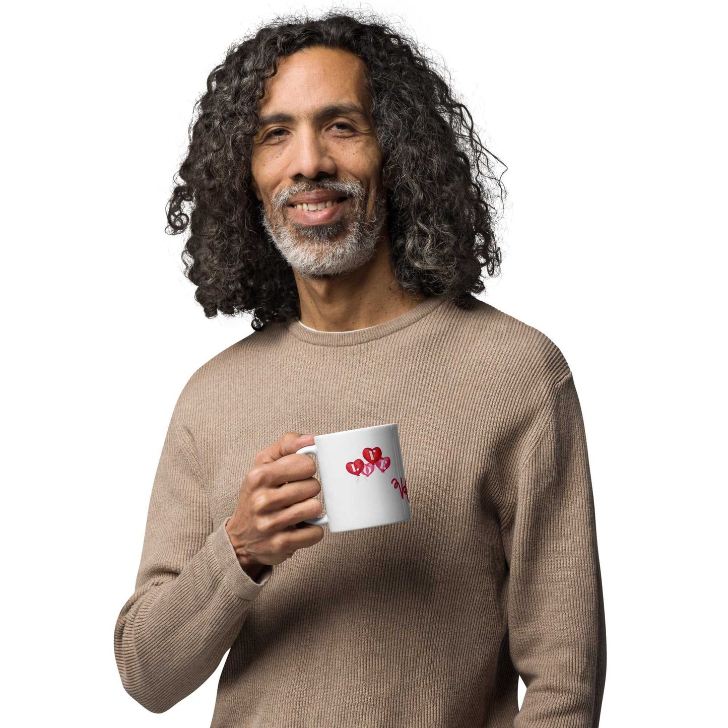 Man smiling while holding Valentine Mug Ceramic with red heart balloon design, 11oz, dishwasher safe love-themed mug.