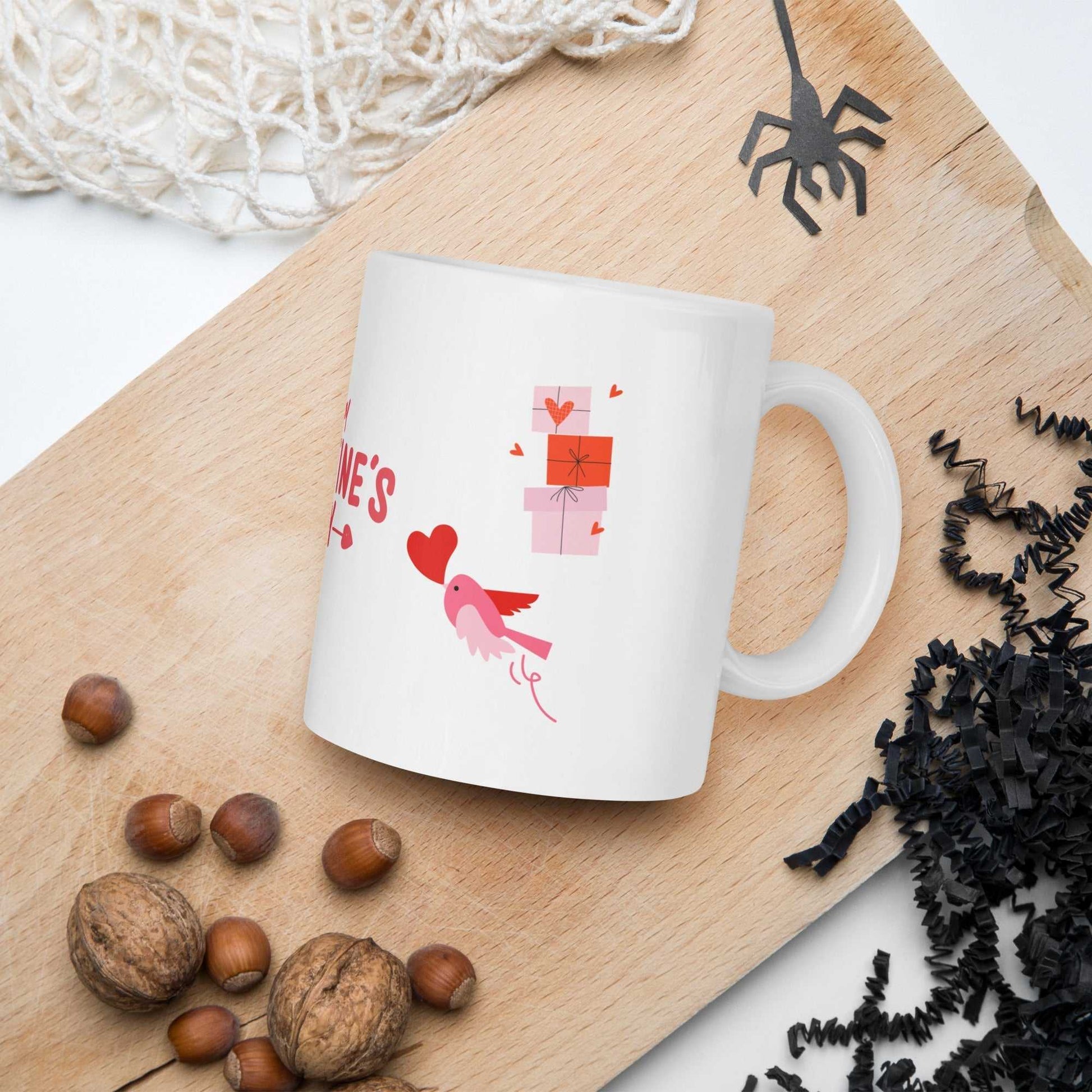 Valentine mug gift with little bird, hearts, and gift boxes on white ceramic; dishwasher safe and perfect for romantic gifting.