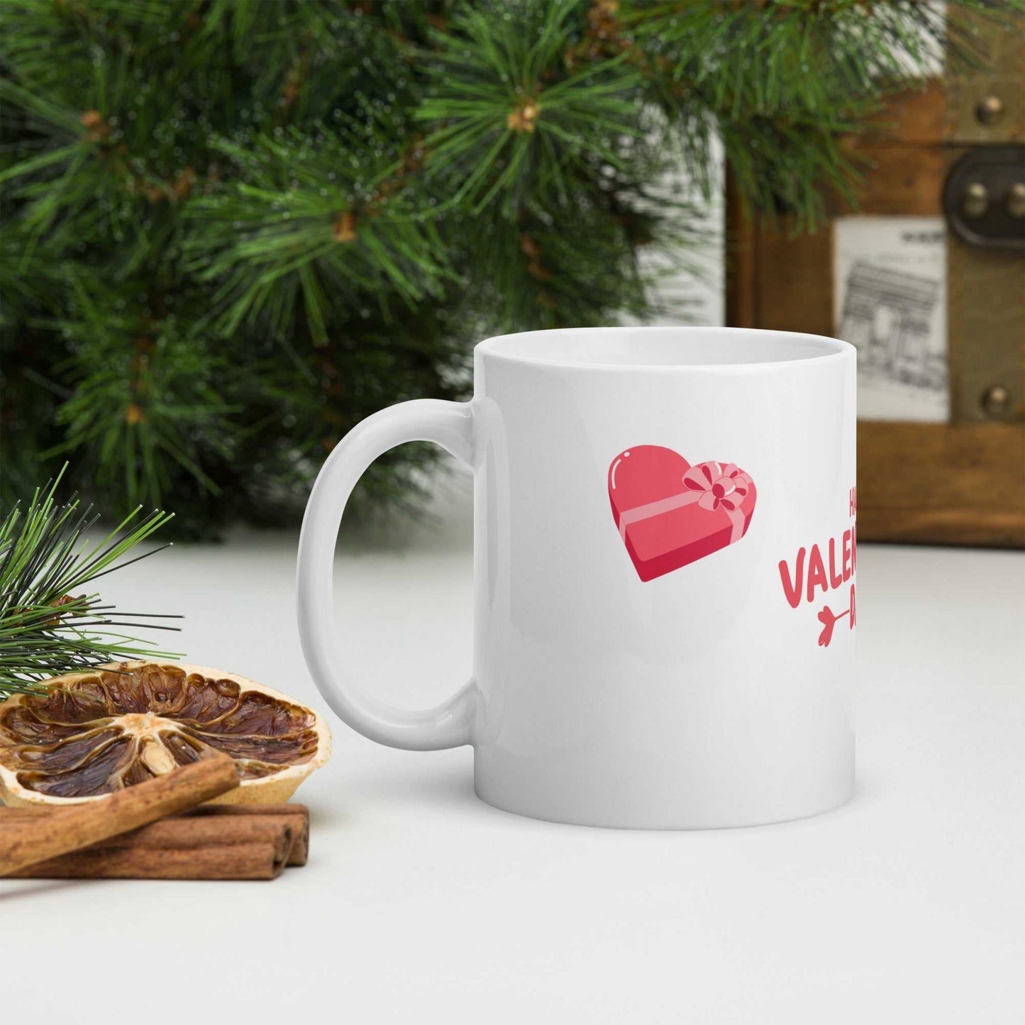 White ceramic mug with heart-shaped gift design and 'Happy Valentine's Day' text; durable and microwave safe.