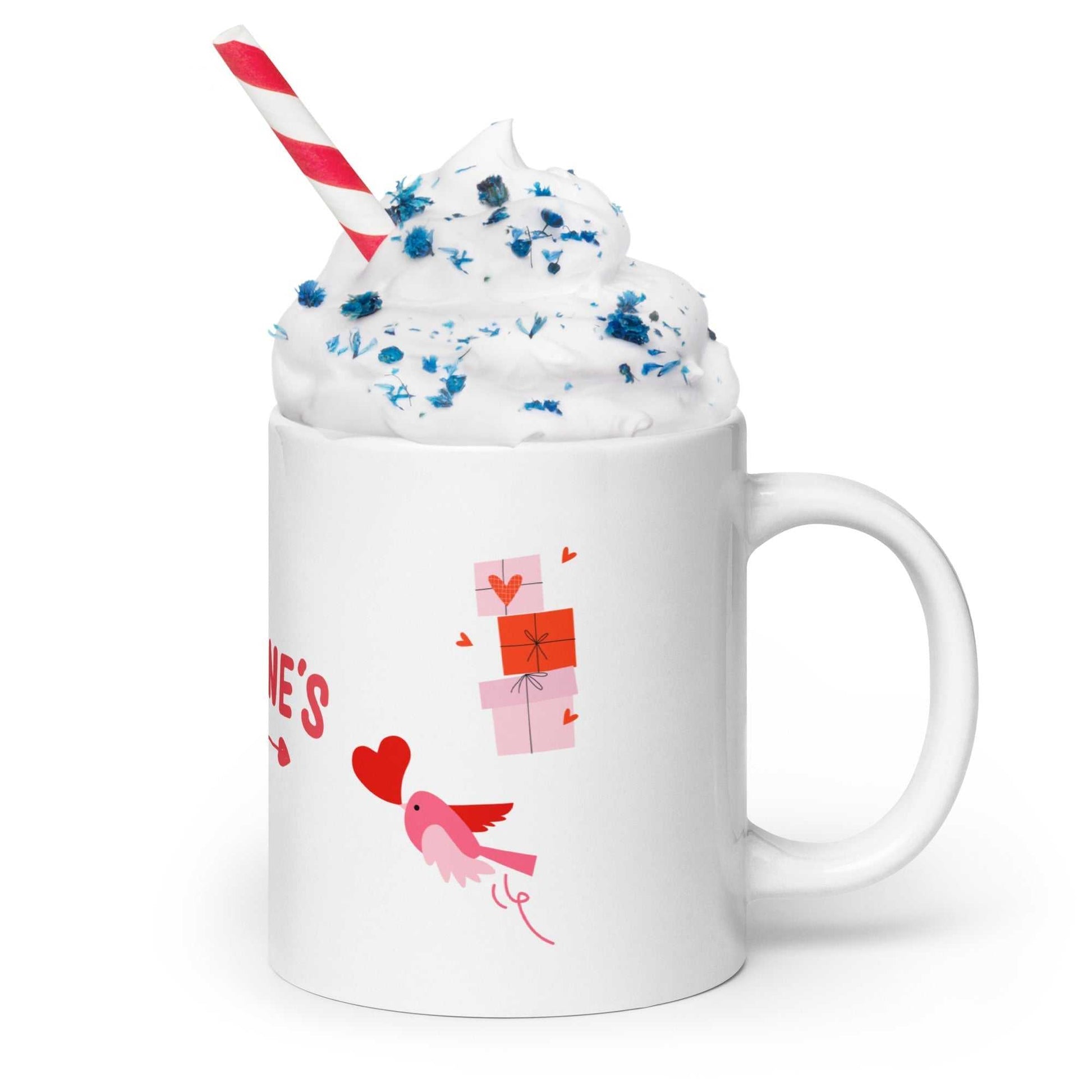 Little bird and gift boxes on valentine mug with whipped cream and sprinkles. Ideal ceramic mug gift for Valentine's Day celebrations.