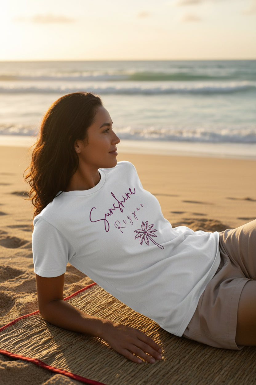 White t-shirt with 'Sunshine Reggae' text and palm tree design on a white background