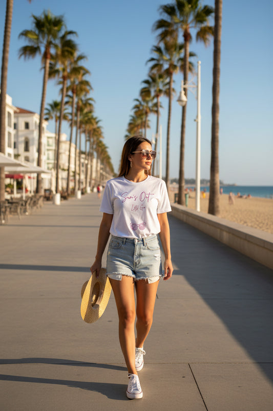 White t-shirt with pink sunglasses and text design on a white background